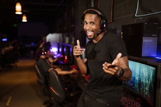 Smiling man in gaming center embracing excitement and technology.